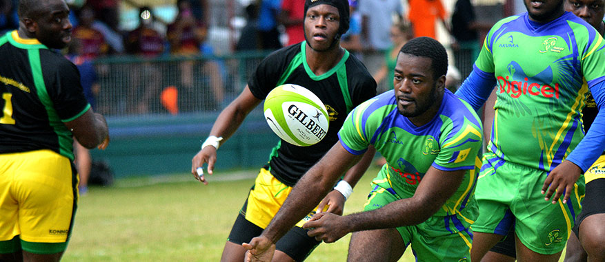 Rugbly players tussle for the ball during a heated match